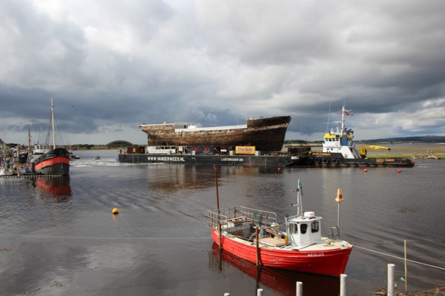 CITY OF ADELAIDE on her barge being pushed downstream on the River Irvine. Photo by Peter Roberts (CSCOAL).