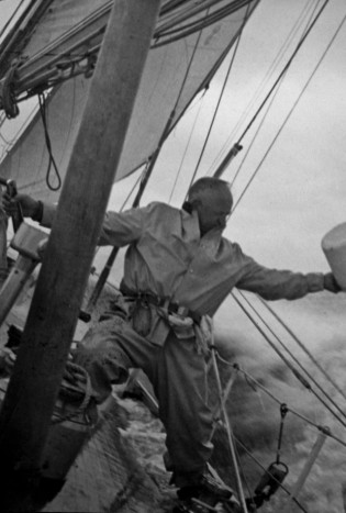 Captain Fred Lawton, tethered on the deck of Bolero, 1950.